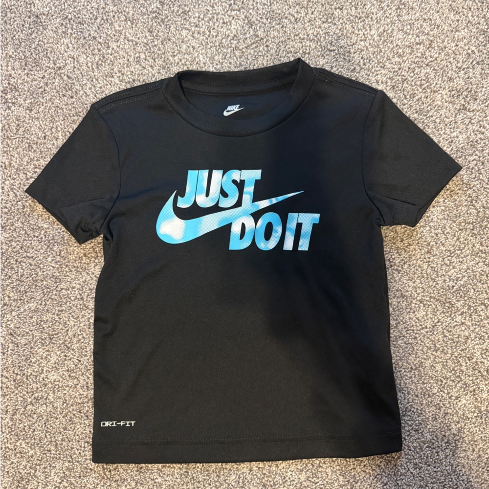 Nike Kids Black Tee with Blue 'Just Do It' Logo